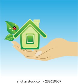 Vector imag. On a blue background image of the human hand with the house 
