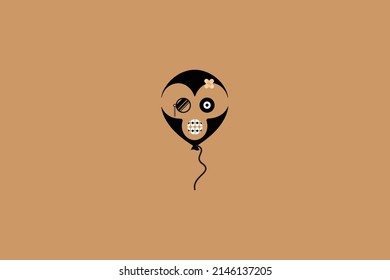 Vector image of a balloon in the shape of a monkey head with side glasses and braces