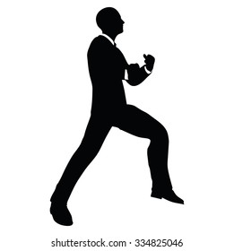 Vector Image - businessman silhouette in gorilla pose isolated on white background