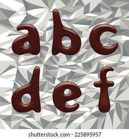 Imagen vectorial de letras pequeñas del alfabeto chocolate en la lámina de aluminio