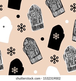 Vector image of cozy winter mittens and snowflakes on a pink background.