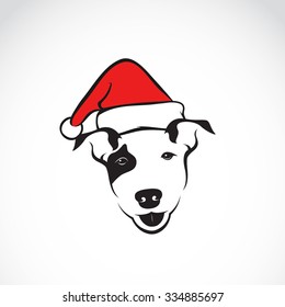 Vector image of an dog and santa hats on white background. Merry christmas