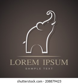 Vector image of an elephant design on brown background
