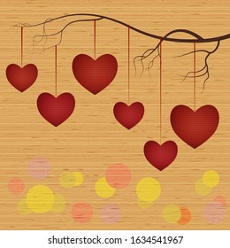 Vector image in the form of red knitted hearts hanging on a tree branch, on a wooden background. EPS10. 