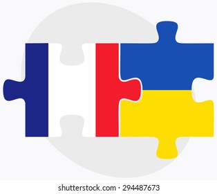 Vector Image - France and Ukraine Flags in puzzle isolated on white background