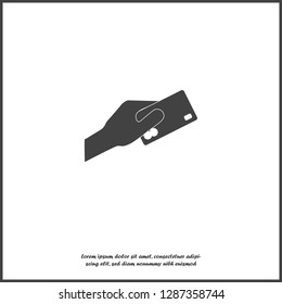 Vector image  hand holding a credit card. Credit card  on white isolated background.