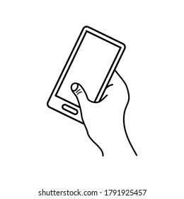 Vector image of a hand holding a mobile. Basic line icon.