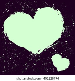 The vector image of the heart. Splashes of ink