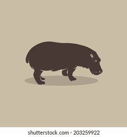 Vector image of an hippopotamus on brown background