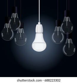 A vector image is an included energy-saving lamp among several turned off lamps