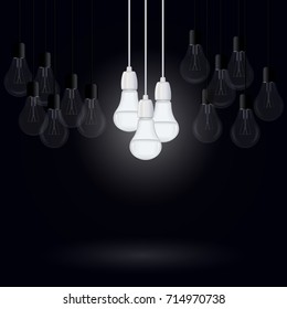 A vector image is an included group of energy-saving lamps among a few switched off lamps