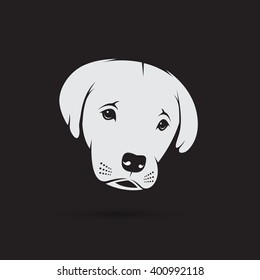 Vector image of an labrador puppy face on black background. Dog design