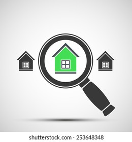 Vector image of a magnifying glass and Real Estate