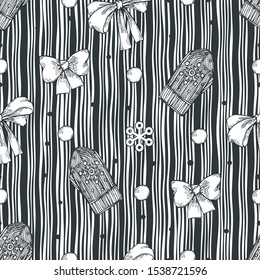 Vector image of mittens with snowflakes, bows, circles and snowflakes drawn on them on a striped background. Seamless background for textile, wallpaper and design.