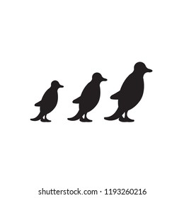 Vector image  of penguins' silhouettes