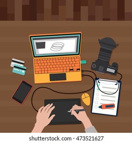 vector image of Photographer working on a laptop