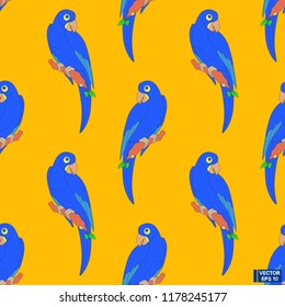 Vector image. Seamless pattern. Blue parrots on a yellow background.