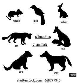 Vector image. Set of silhouettes of wild and domestic animals. Fox hare, cat, mouse, bird, dog and wolf
