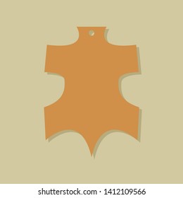 Vector image of sheep skin on a beige background with shadow.