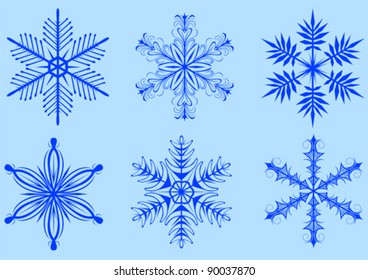 Vektorbild von Schneeflocken auf blauem Hintergrund