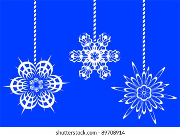 Vector image of white snowflakes on a blue background