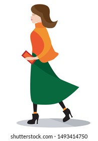 Vector image of a young brunette woman in a skirt and sweater walking and holding a clutch bag in her hand.