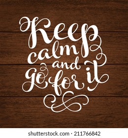 Vector inscription with ornamental elements on wood background. "Keep calm and go for it" poster or postcard. Typography collection