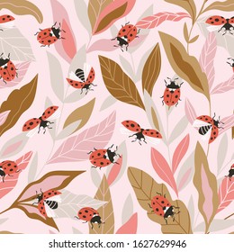 Vector insect seamless pattern. Hand-drawn ladybugs and leaves on the pink background. Beautiful summer print.  