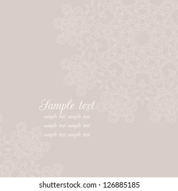 Vector invitation card with delicate beige background.