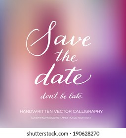 Vector invitation card with handwritten calligraphy and purple blurry photographic bokeh background. Save the Date