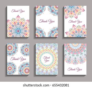 Vector Invitations set. Mandala design elements. Invite templates A6. Colorful round ornaments. Flower greeting cards, thank you notes. Weave floral pattern. Unusual yellow pink blue backgrounds.
