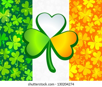 Vector Irish flag background made from green and orange clovers with big clover on it. Raster illustration.