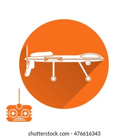 Vector isolated icon of drone silhouette with shadow and remote control on the orange background.