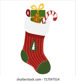 A vector isolated on white background - decorated christmas socks in christmas colours full of gifts and sweet.