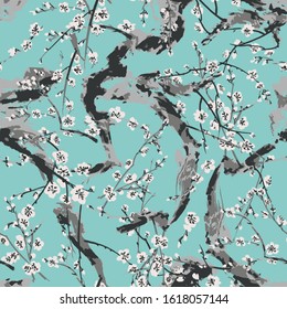 Vector Japanese sakura seamless pattern with white flowers on a blue background. Background made without clipping mask
