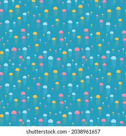 vector jelly fish pink, yellow and blue seamless pattern on blue background