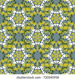 Vector kaleidoscope seamless pattern in yellow, neutral and white colors. Mandala geometric graphic print. Psychedelic design element for wallpaper, scrapbooking, fabric.