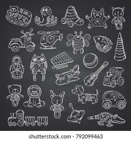 Vector kid toys set hand drawn and isolated on black chalkboard background illustration