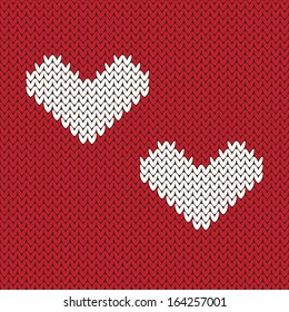 Vector knitted seamless background. White hearts on red background.