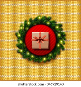 vector knitted yellow ornamental background with a Christmas wreath and gift box