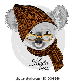 Vector koala with glasses, knitted hat and scarf. Hand drawn illustration of dressed koala bear.