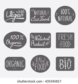 Vector labels with vegetarian and raw food diet designs. Organic food tags and elements set for organic products packaging. Vector illustrated bio detox logo.