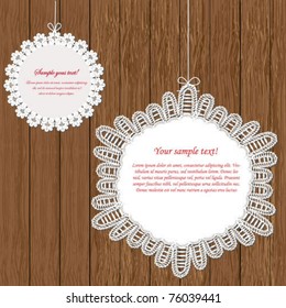 Vector lace frame on wooden background