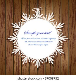 Vector lace frame on wooden background