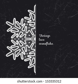Vector lace snowflake style vintage handmade lace. White lace over black background.
