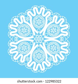 Vector lace. White snowflake on a blue background.