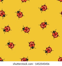 Vector ladybug seamless pattern. Red ladybird cartoon symbols on yellow background. Cute dotted lady bug summer illustration.