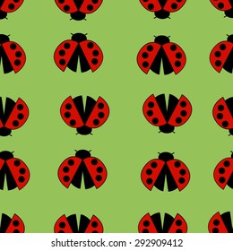 Vector ladybug seamless pattern. Seamless texture with the image of the ladybug on green background. Colorful background with ladybugs.  