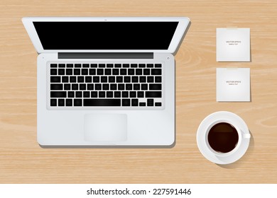 Vector laptop computer and cup of coffee on wooden background.
