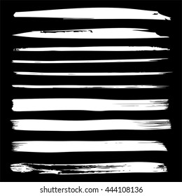 Vector large collection or set of artistic white paint hand made creative brush strokes isolated on black background, metaphor to art, grunge or grungy, sketch, education or abstract design